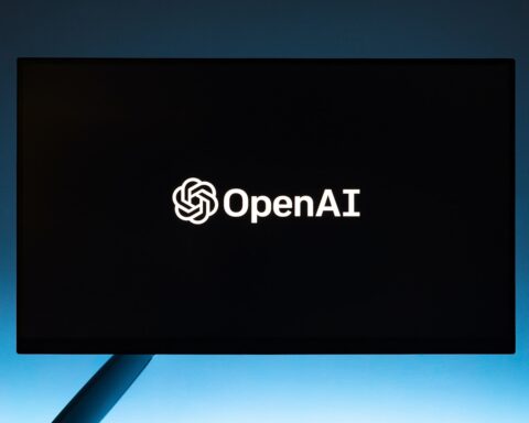 Open AI logo on computer monitor